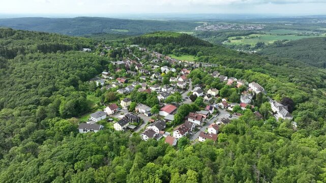 Cinematic drone footage showing Kelkheim-Eppenhain in the Taunus mountains of Hesse, Germany