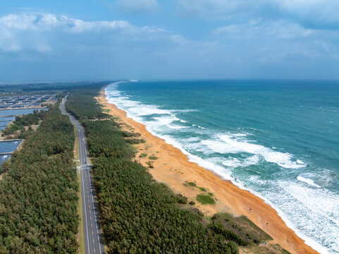 aerial view of waves on the beach
