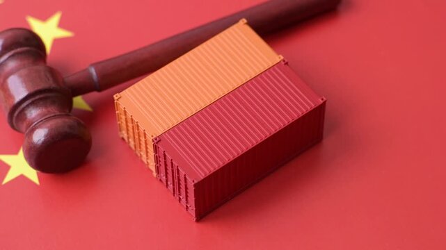 The cargo container ban on the China flag as a conceptual backdrop for the export and logistics of goods. The cargo container embargo on the China flag as a backdrop for your design