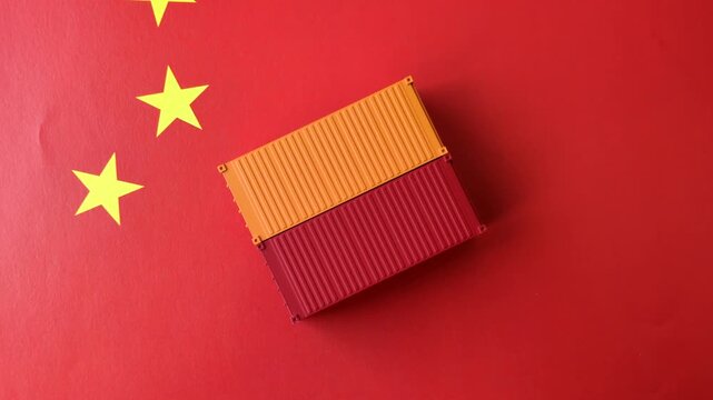 Cargo containers on the china flag as a conceptual backdrop for goods export and logistics. Cargo containers on the china flag as a background for your design
