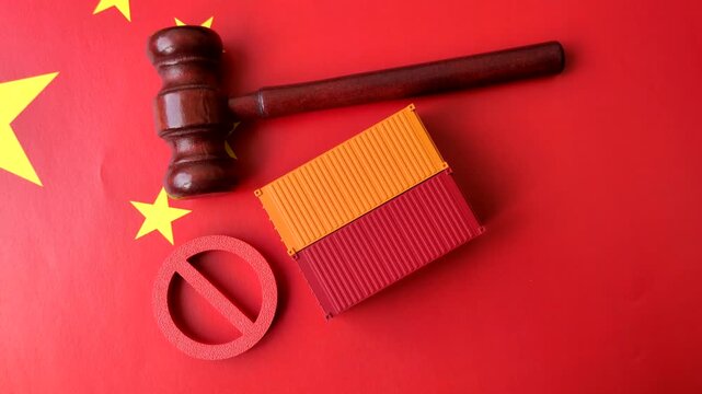 The cargo container ban on the China flag as a conceptual backdrop for the export and logistics of goods. The cargo container embargo on the China flag as a backdrop for your design