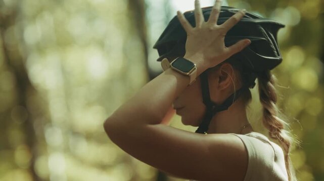 Cyclist Putting On Protective Helmet. Athlete Preparing For Bicycle Ride Workout. Safety Equipment