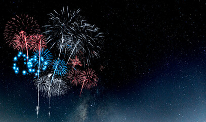 Obraz premium Red and Blue Fireworks on night background