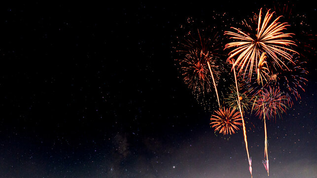 Fireworks with blur milky way background
