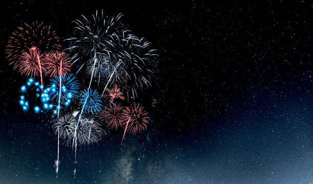 Red and Blue Fireworks on night background