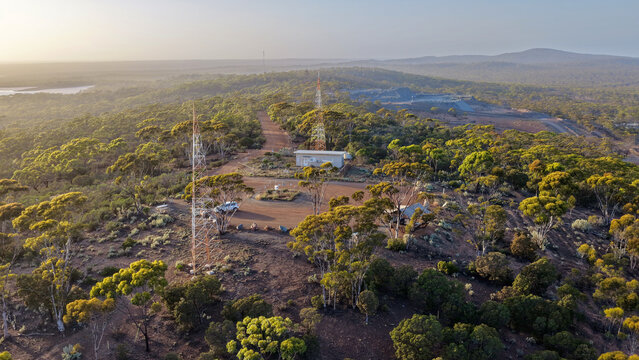 Beacon Lookout, Norseman, Western Australia &ndash; 4K Aerial Drone Footage of Outback Forest, Remote Wilderness, Communication Towers and Golden Sunset Sky near Dundas
