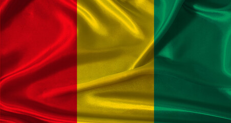 Obraz premium National flag of Guinea with cloth texture. Guinea flag with realistic texture background
