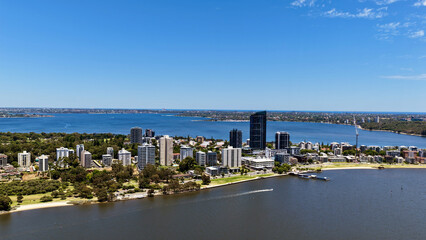 Naklejka premium South Perth, Perth City, Western Australia, Australia – 4K Aerial Drone View of City Skyline, Swan River, Sir James Mitchell Park, Riverside Highway, Residential Houses and Estates