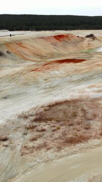 An Expansive View Of Weathered Ridges And Eroded Gullies Beneath Overcast Skies Portrays Loneliness. Media