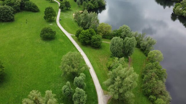Aerial view of path, lake, and nature