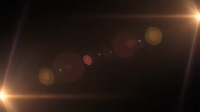 Abstract lens flare effect on black background animation for overlay or transition