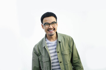 Obraz premium adult asian man.portrait young male.person posing smiling laughing and fun excited surprised thinking positive happy people.empty space for text advertising.background.attractive fashion