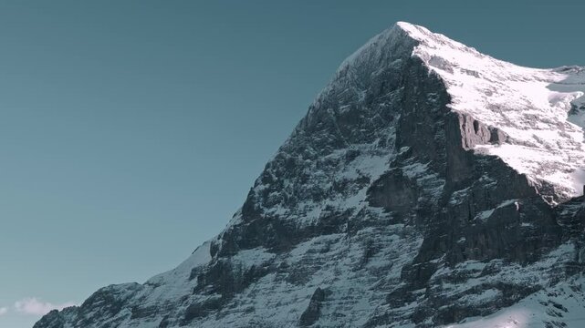 Beautiful Snowcapped Mountain Peak Eiger North Face at 3970 Meter High in a Sunny Winter Day in Grindelwald, Kleine Scheidegg, Bernese Oberland, Bern Canton, Switzerland.