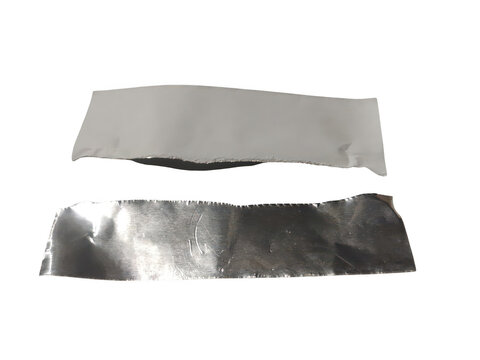 Two shiny metallic sheets with crumpled edges