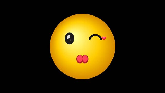 A bright yellow winking emoji face with red puckered lips isolated on black background