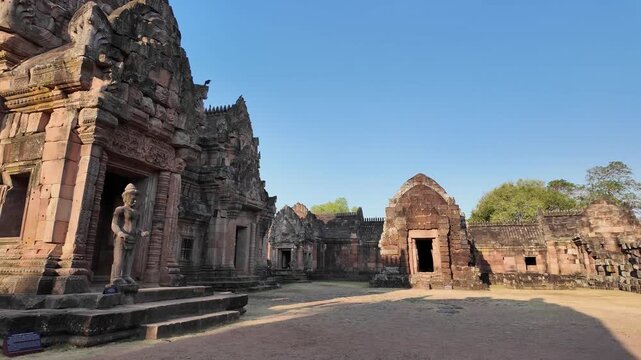 Wide 4K POV walk-through ancient Hindu temple inner courtyard, Khmer style sanctuaries, Phanom Rung Historical Park, Buri Ram, Thailand