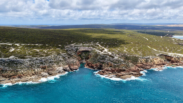 Pelamis Point, Sleaford, South Australia &ndash; 4K Aerial Drone view of Fishery Bay, rocky headlands, limestone cliffs, ocean waves, rugged Eyre peninsula coastline in Lincoln National Park