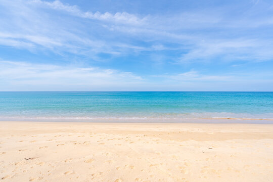 Beautiful sandy beach and sea with clear blue sky background Amazing beach blue sky sand sun daylight relaxation landscape view in Phuket island Thailand for Summer and travel background