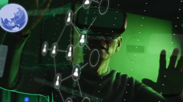 Man wearing VR visor manipulating projected holo network appearing, inspecting cards for tech demo