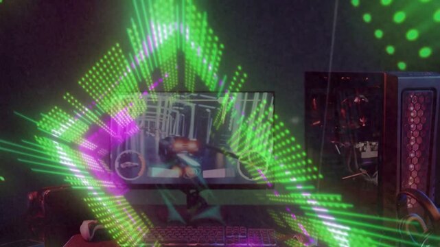 Audio driving green-magenta visualizer pulsing, forming rotating diamonds over monitor RGB PC