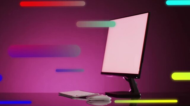 Playback starting, graphic bars sliding across desk and overlapping monitor, highlighting product