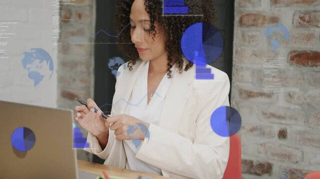 Woman handling pen at laptop while data overlay appearing and driving business chart analysis