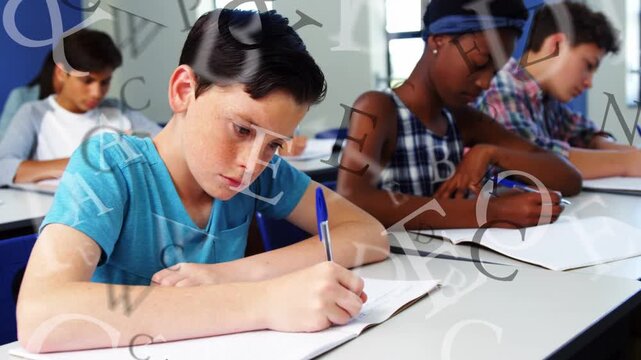 Students starting assignment in classroom, boy in blue T-shirt writing, letters overlaying scene