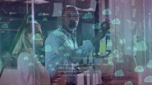 Lead tapping tablet, placing notes on glass for business planning, cloud overlay appearing on board