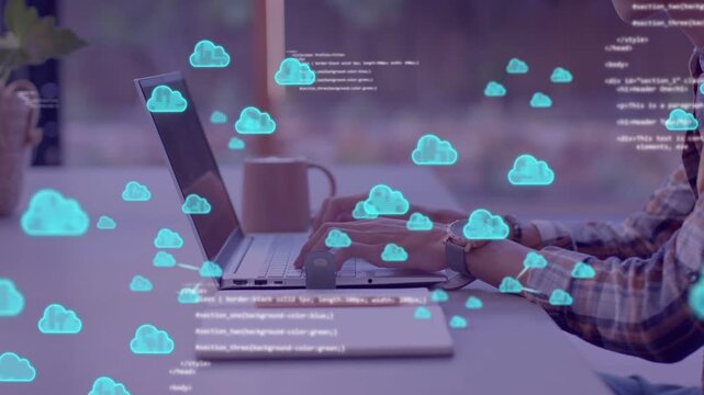 Software developer typing at laptop causing cloud icons and code overlays that network then recede