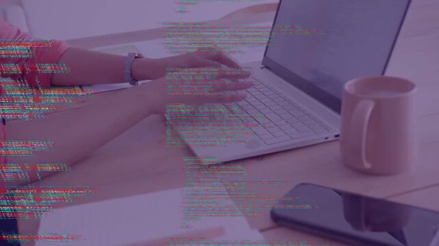 Woman reaching laptop and typing, working on code while overlay obscuring hands then easing