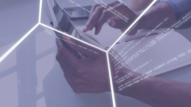 Man tapping phone and typing laptop at desk, activating holographic code cube for software review
