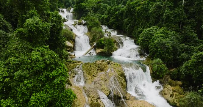 Drone view of waterfalls that so-called stairway to heaven, the Aliwagwag Falls. Mindanao, Philippines.
