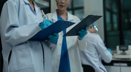 scientist or doctor team with tech for scientific innovation, planning or data report. © NINENII