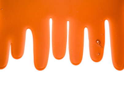 Orange liquid transparent gel dripping down, isolated on transparent background. PNG Image.
