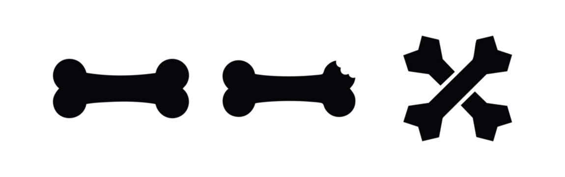 Set of black dog bone silhouettes including a standard bone, a chewed bone with a bite mark, and crossed bones. Isolated on white background.