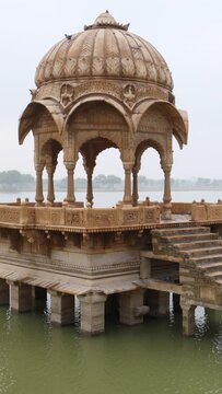 Chhatri pavilion at Gadisar Lake in Jaisalmer, Rajasthan, India, vertical video.