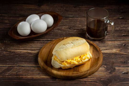 Bread with egg. Bread filled with scrambled eggs, known in Brazil as "P&atilde;o com ovo".