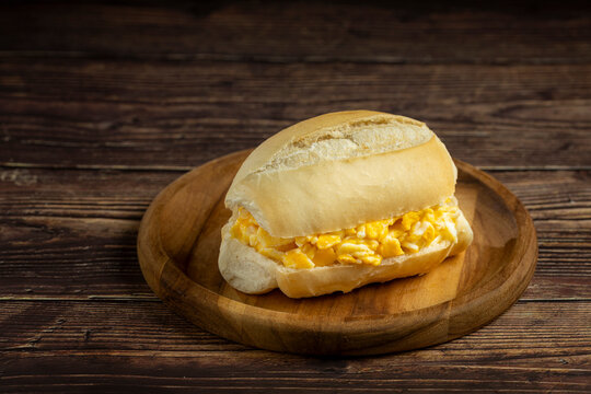 Bread with egg. Bread filled with scrambled eggs, known in Brazil as "P&atilde;o com ovo".