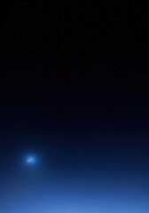Obraz premium Stunning Night Sky with Bright Blue Glowing Celestial Object and Countless Stars Background