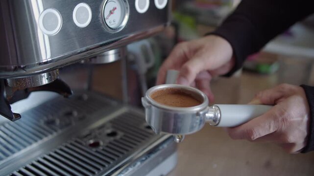 Tamping Coffee Grounds in Portafilter for Espresso