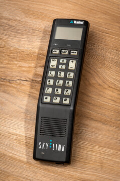 Italtel Skylink cellular phone from 1990 on wood background