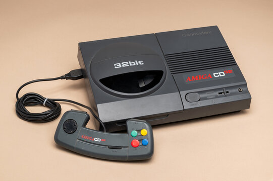 Commodore Amiga CD32 vintage 32-bit video game console with controller, 1993