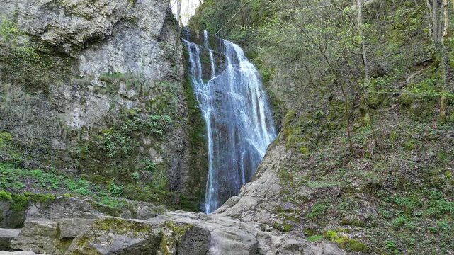 Cinematic Aerial Movement Around Forest Waterfall