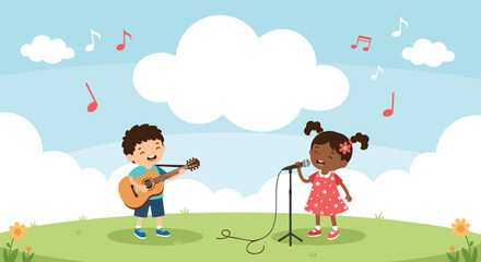Obraz premium Talented young boy plays acoustic guitar while girl sings into microphone on a beautiful sunny day in the park.