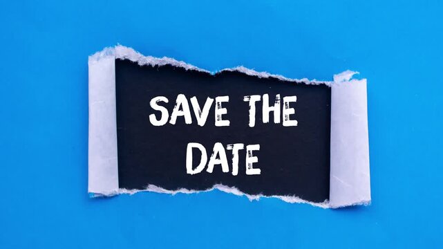 Save the date message writing on ripped torn paper background