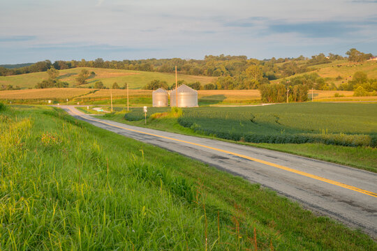 rural highway across hilly Missouri farmland, summer scenery