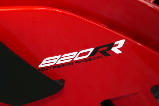 Qingdao,China-May.22.2026:A row of vibrant red ZXMOTO 820RR sportbikes with aerodynamic winglets is lined up inside a dealership showroom.