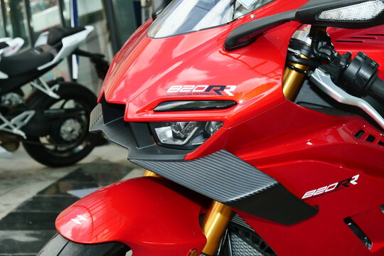 Qingdao,China-May.22.2026:A row of vibrant red ZXMOTO 820RR sportbikes with aerodynamic winglets is lined up inside a dealership showroom.
