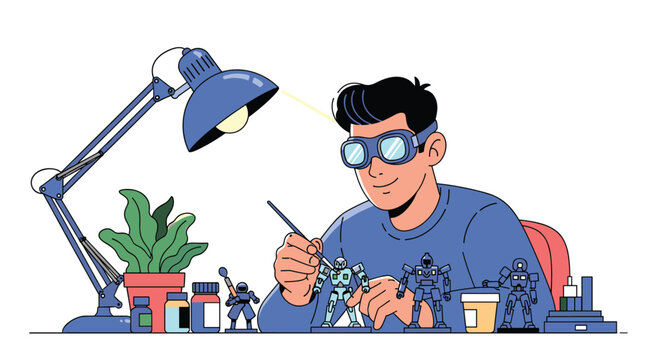 Creative young man wearing safety goggles focused on painting small plastic robot models at a well-equipped hobby desk.