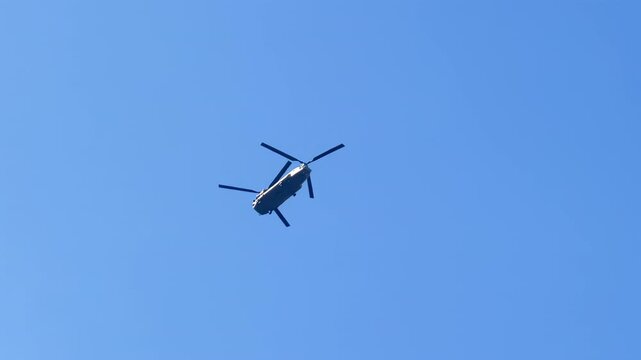 Recon helicopter scouting the skies for film footage or military surveillance. Boeing CH-47